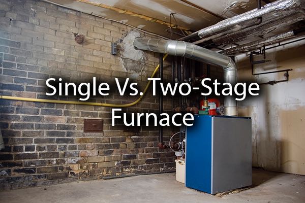 A furnace in the basement with the words, single vs, two stage furnace.